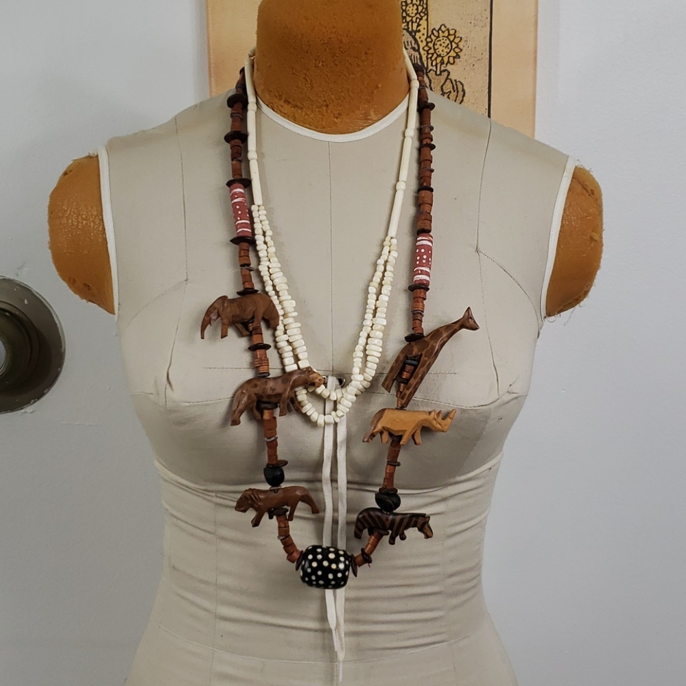 Wood carved safari animal & bone necklace